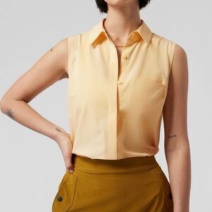 ATHLETA Urbanite II Butter Yellow Top L/T Sleeveless Collared Button Down Pocket